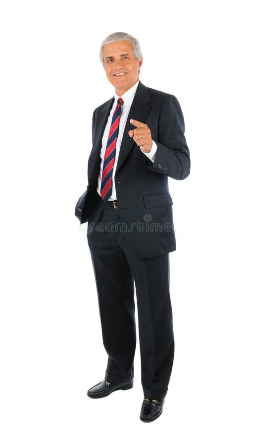 Smiling middle aged businessman standing and pointing with one hand and the other hand in his pocket. Full length over a white background. Smiling middle aged businessman standing and pointing with one hand and the other hand in his pocket. Full length over a white background.