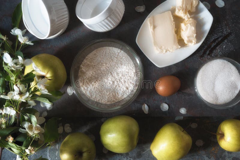 Apples, flour, sugar for the Apple tarte tatena horizontal. Apples, flour, sugar for the Apple tarte tatena horizontal