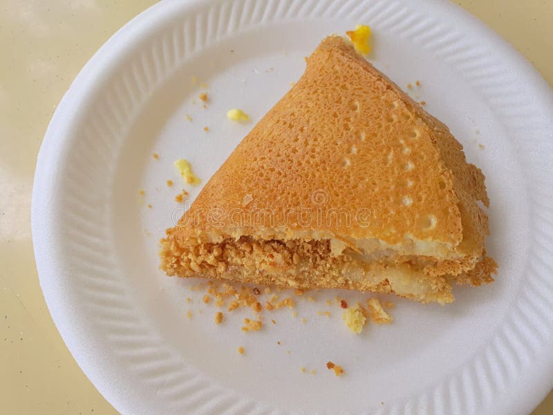 μαλαισιανές ελευθερίες. το apam balik είναι ένα είδος κέικ από μαλαγιααπάμ balik συνήθως πωλείται σε εξειδικευμένους υπαίθριους πάγκους σε όλη τη μαλαισία και σιγκαπούρη
