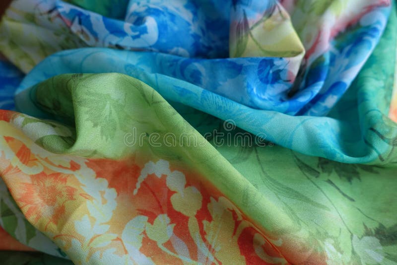 Soft folds of thin viscose chiffon fabric. Soft folds of thin viscose chiffon fabric