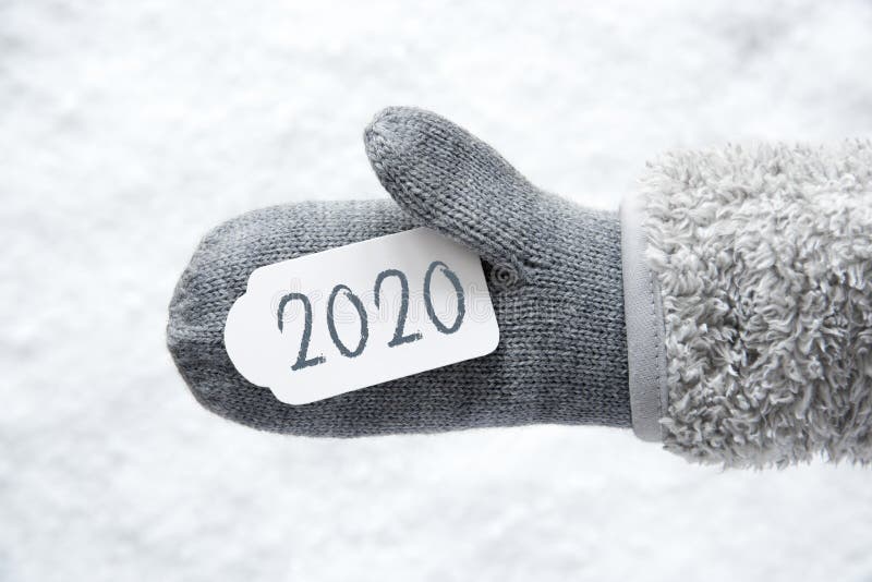 Μαλλί γάντι, ετικέτα, χιόνι, κείμενο 2020, λευκό φόντο στοκ εικόνες