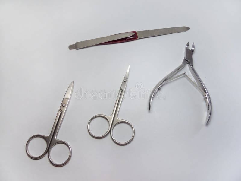 Μανικιούρ καθορισμένο: Nipper καρφιών, ευθύ ψαλίδι ψαλίδι επιδερμίδων (ψαλίδι καρφιών που κάμπτεται) και nailfile στοκ φωτογραφίες με δικαίωμα ελεύθερης χρήσης Μανικιούρ καθορισμένο: Nipper καρφιών, ευθύ ψαλίδι ψαλίδι επιδερμίδων (ψαλίδι καρφιών που κάμπτεται) και nailfile στοκ φωτογραφίες με δικαίωμα ελεύθερης χρήσης