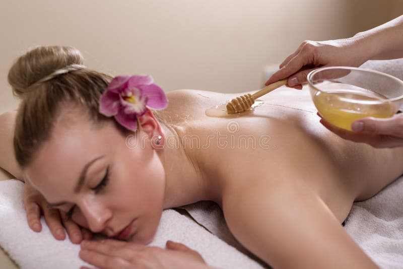Μασάζ με μέλι στοκ φωτογραφίες