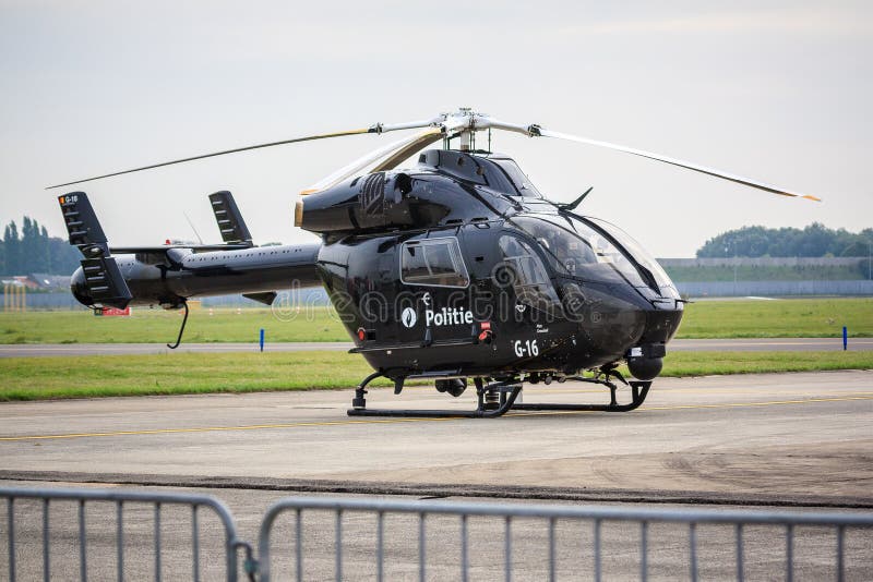 A Black Belgian MD-900 police helicopter with NOTAR (No Tail Rotor) design. A Black Belgian MD-900 police helicopter with NOTAR (No Tail Rotor) design.