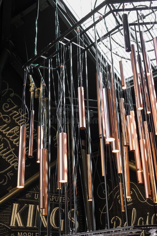 Large wind chimes with contemporary design, installed in an exhibition hall. Large wind chimes with contemporary design, installed in an exhibition hall.