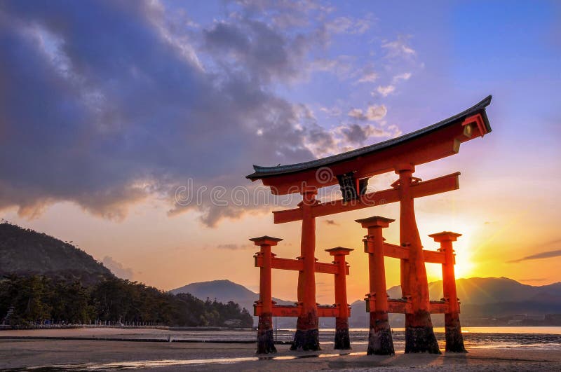 Great torii of Miyajima at sunset, near Hiroshima, Japan. Great torii of Miyajima at sunset, near Hiroshima, Japan