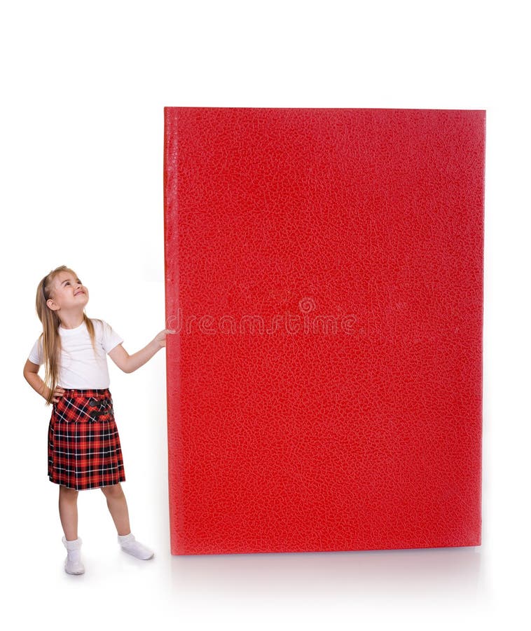 Shoolgirl is holding a huge book, you can place your text on the cover of the book. Shoolgirl is holding a huge book, you can place your text on the cover of the book