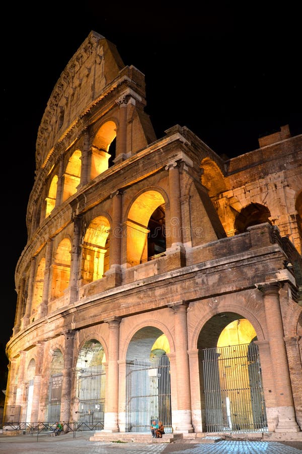 Majestic ancient Colosseum by night in Rome in Italy. Majestic ancient Colosseum by night in Rome in Italy