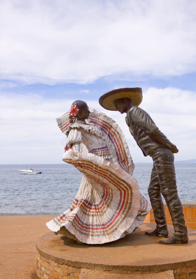 Traditional mexican dancers iron public street sculptures in Puerto Vallarta, mexico. Traditional mexican dancers iron public street sculptures in Puerto Vallarta, mexico.