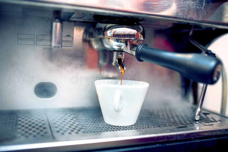 Espresso coffee machine brewing fresh, bio coffee in restaurant or bar. Espresso coffee machine brewing fresh, bio coffee in restaurant or bar