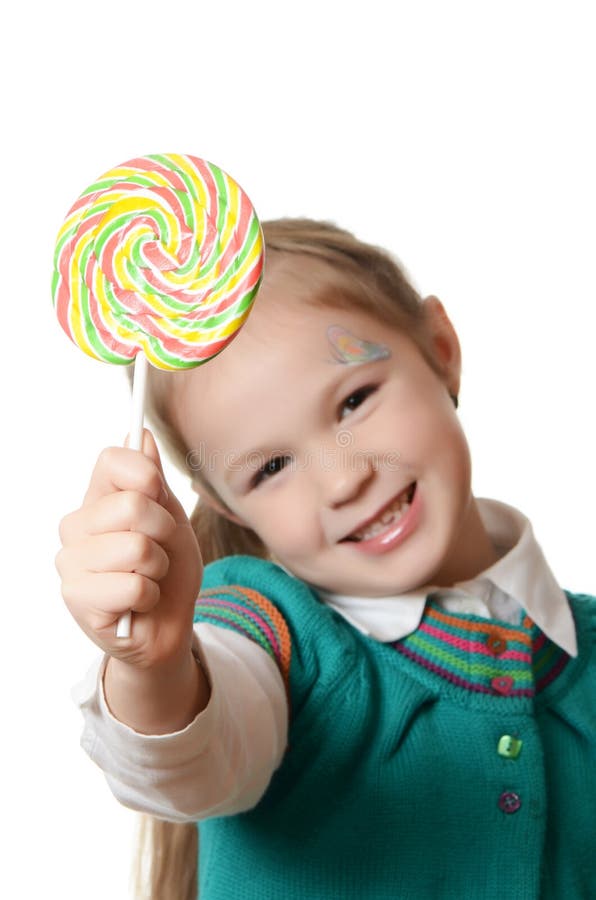 Μικρό κορίτσι με το lollipop στο λευκό στοκ φωτογραφία με δικαίωμα ελεύθερης χρήσης