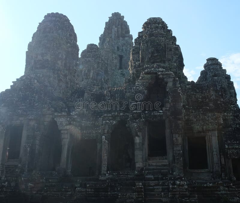 Monumental ancient temple of Bayon in Cambodia. Medieval temple in Indochina. Architectural art of ancient civilizations. Bayon temple in Angkor Thom. Face towers. Monumental ancient temple of Bayon in Cambodia. Medieval temple in Indochina. Architectural art of ancient civilizations. Bayon temple in Angkor Thom. Face towers.