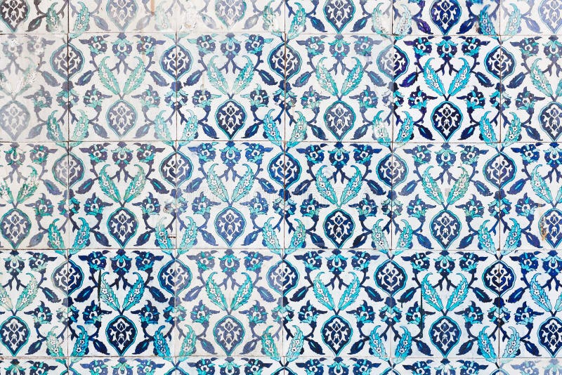 Seamless pattern white Turkish tiles with blue ornaments. Old surface texture, wall in mosque. Seamless pattern white Turkish tiles with blue ornaments. Old surface texture, wall in mosque