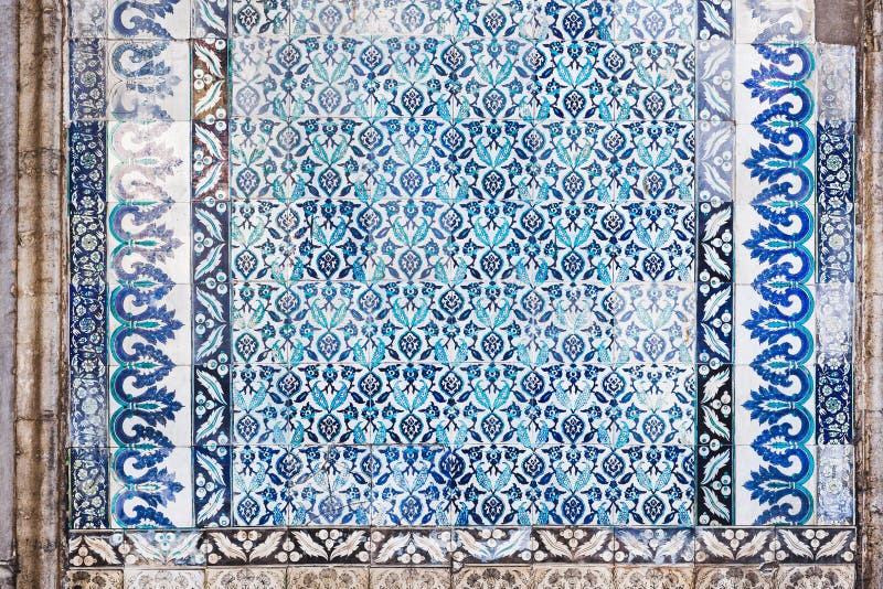 Seamless pattern white Turkish tiles with blue ornaments. Old surface texture, wall in mosque. Seamless pattern white Turkish tiles with blue ornaments. Old surface texture, wall in mosque
