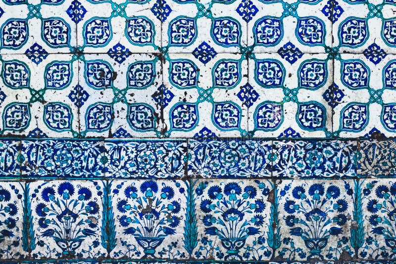 Seamless pattern white Turkish tiles with blue ornaments. Old surface texture, wall in mosque. Seamless pattern white Turkish tiles with blue ornaments. Old surface texture, wall in mosque