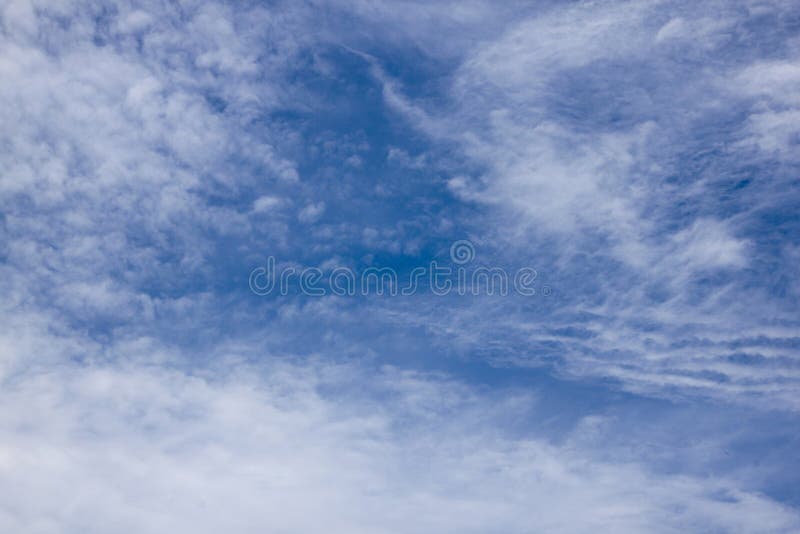 Blue abstract cloudy sky background with patterns and textures. Blue abstract cloudy sky background with patterns and textures