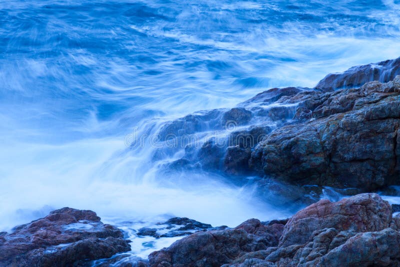 Blue waves and rocks, long exposure. Blue waves and rocks, long exposure