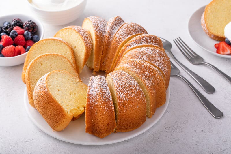 Pound cake baked in a bundt pan, traditional vanilla or sour cream flavor, dusted with powdered sugar. Pound cake baked in a bundt pan, traditional vanilla or sour cream flavor, dusted with powdered sugar