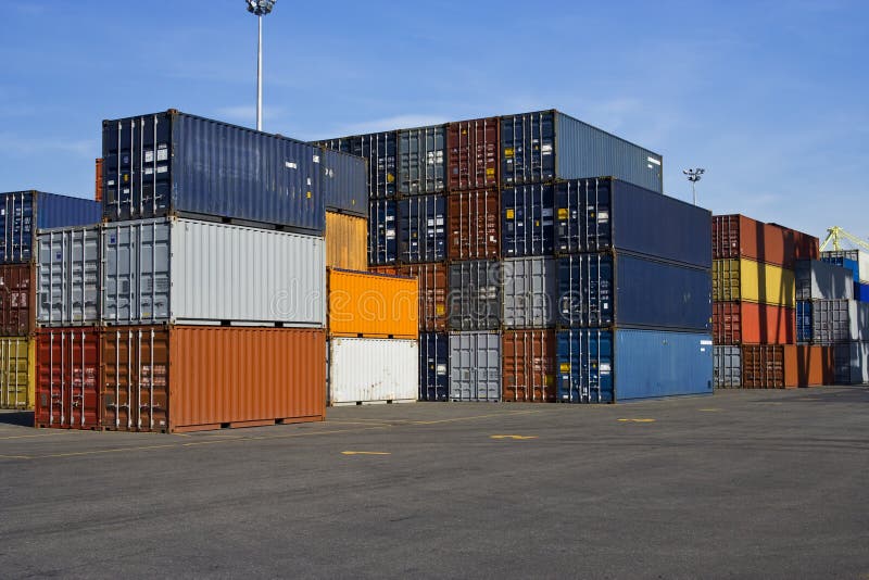 Stacks of orange and blue containers in a major port. Stacks of orange and blue containers in a major port