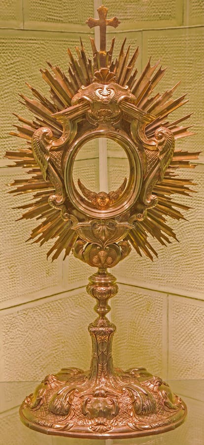 BRATISLAVA, SLOVAKIA - OCTOBER 11, 2014: The baroque monstrance in sacristy of st. Martins cathedral. BRATISLAVA, SLOVAKIA - OCTOBER 11, 2014: The baroque monstrance in sacristy of st. Martins cathedral.