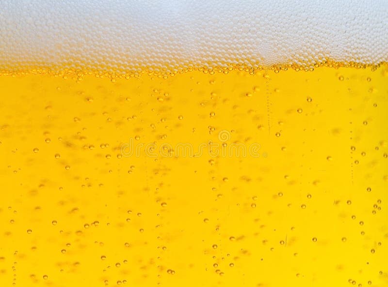 Close up of beer with bubbles and foam. Close up of beer with bubbles and foam