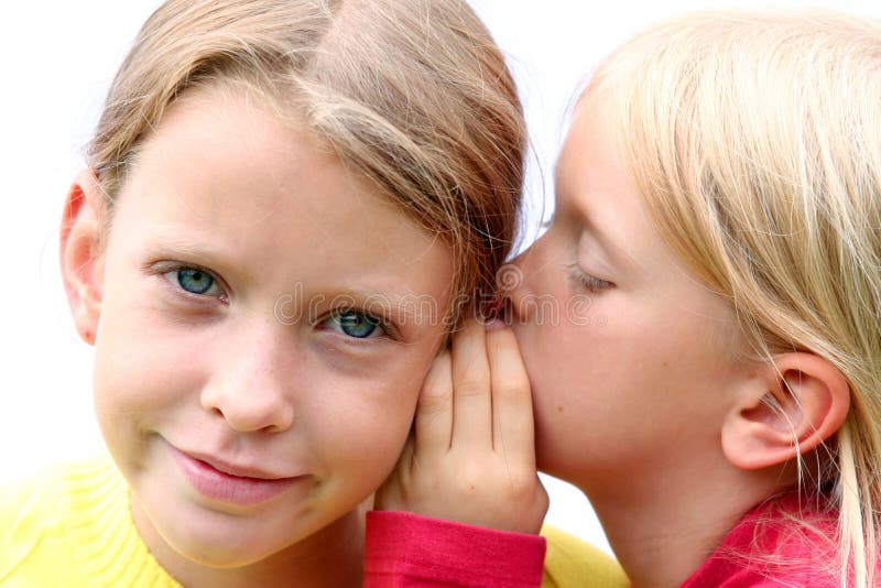 One girl giving the other an earful. One girl giving the other an earful