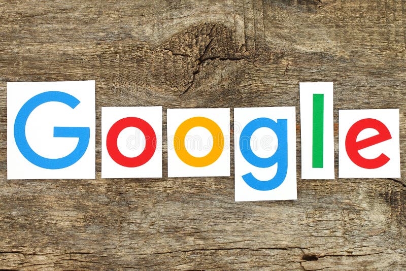 Νέο Google logotype στο παλαιό ξύλο στοκ εικόνες
