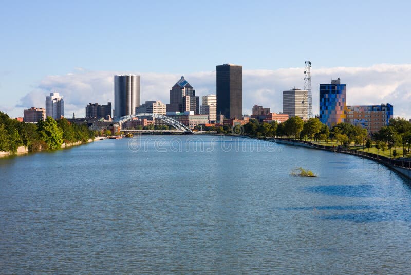 Skyscrapers next to a river in Rochester. Skyscrapers next to a river in Rochester