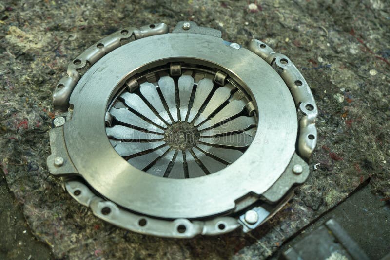 View on new clean car truck clutch component part detail. Car clutch disc disk parts details components for maintenance repair Car. View on new clean car truck clutch component part detail. Car clutch disc disk parts details components for maintenance repair Car