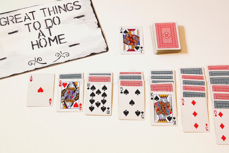 Great things to do at home solitaire game on white background motivation for quarantine. Great things to do at home solitaire game on white background motivation for quarantine