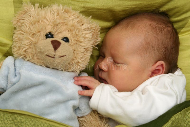 Newborn baby - 3 weeks old baby - with sweet teddy bear. Newborn baby - 3 weeks old baby - with sweet teddy bear.