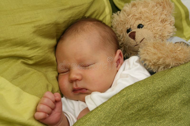 Newborn baby - 3 weeks old baby - with sweet teddy bear. Newborn baby - 3 weeks old baby - with sweet teddy bear.