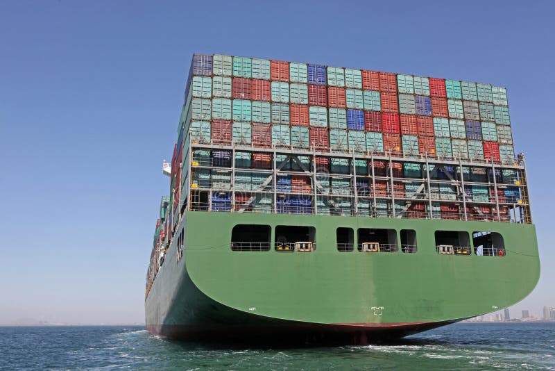 Ocean-going freighters transporting containers. Ocean-going freighters transporting containers