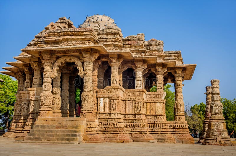 GUJARAT, INDIA - DECEMBER 04, 2016: The Sun Temple at Modhera village near Mehsana District. The Sun Temple is a Hindu temple dedicated to Lord Surya. GUJARAT, INDIA - DECEMBER 04, 2016: The Sun Temple at Modhera village near Mehsana District. The Sun Temple is a Hindu temple dedicated to Lord Surya.