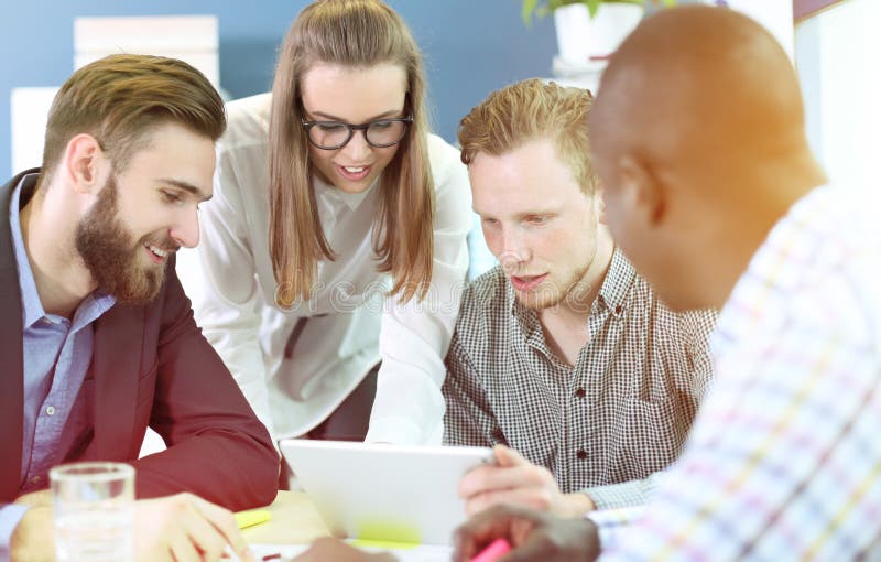 Young professionals work in modern office. Project manager team discussing new idea. Young professionals work in modern office. Project manager team discussing new idea.