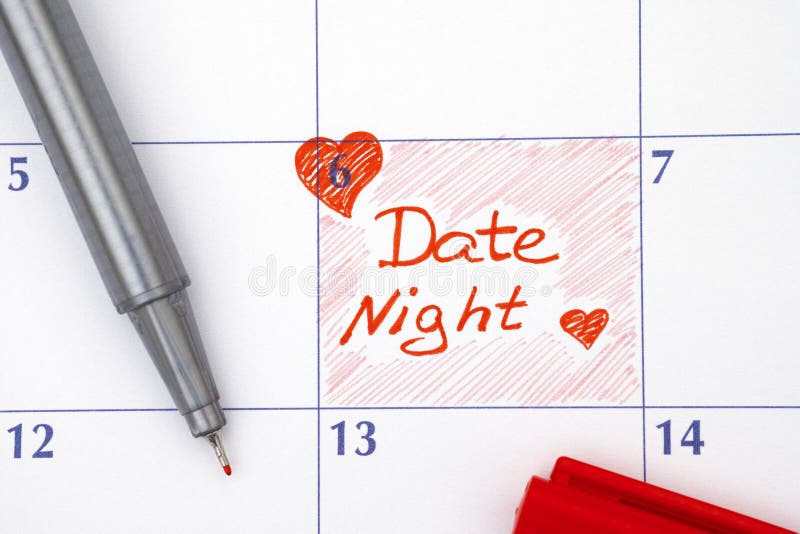 Reminder Date Night in calendar with red pen. Reminder Date Night in calendar with red pen