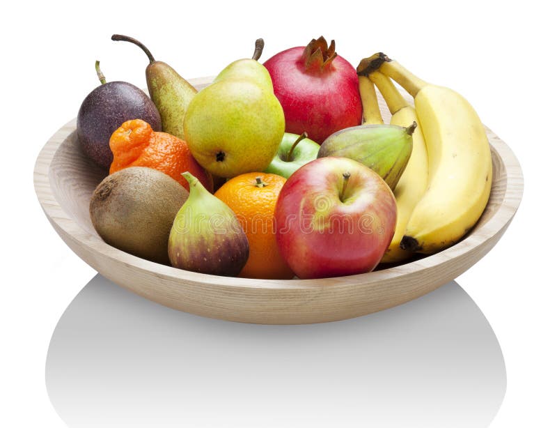 Fresh fruit in a wood bowl on a white background with a reflection. Fresh fruit in a wood bowl on a white background with a reflection