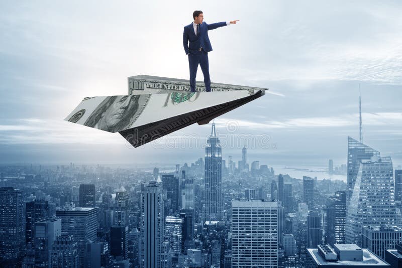 Businessman flying on paper plane in business concept. Businessman flying on paper plane in business concept