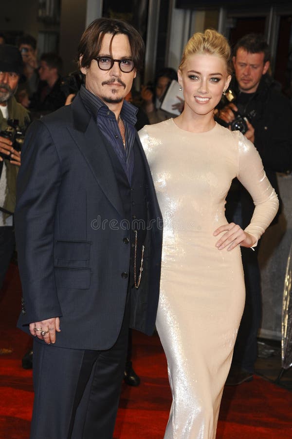 Johnny Depp and Amber Heard arriving for the premiere of Rum Diary at the Odeon Kensington cinema, London. 03/11/2011 Picture by: Steve Vas / Featureflash. Johnny Depp and Amber Heard arriving for the premiere of Rum Diary at the Odeon Kensington cinema, London. 03/11/2011 Picture by: Steve Vas / Featureflash