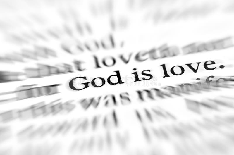 Detail closeup zoom God is love scripture in bible verse. Detail closeup zoom God is love scripture in bible verse