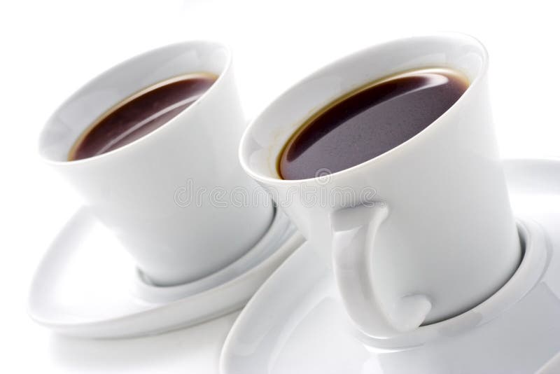 Two coffee cups against white background. Two coffee cups against white background