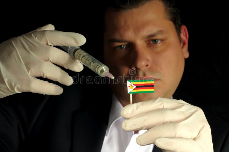 Ο νέος επιχειρηματίας δίνει μια οικονομική έγχυση στην της Ζιμπάμπουε σημαία στοκ εικόνα