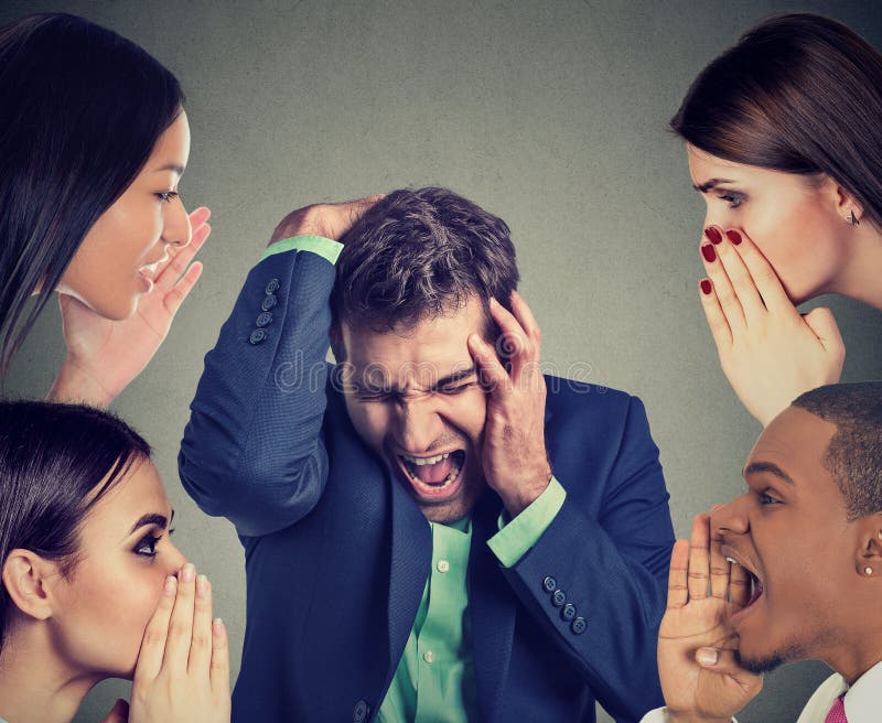 Group of people men and women whispering to a desperate stressed business man. Group of people men and women whispering to a desperate stressed business man