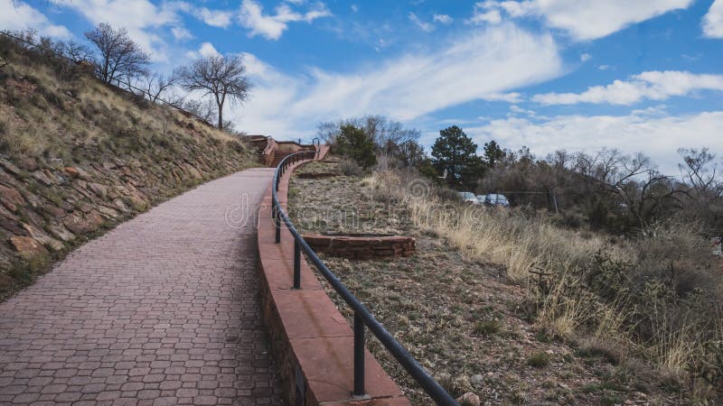 Path leading uphill in historic Fort Marcy Park near downtown Santa Fe, New Mexico, USA. Path leading uphill in historic Fort Marcy Park near downtown Santa Fe, New Mexico, USA