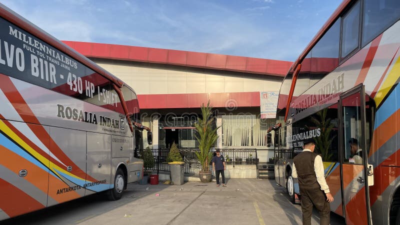 West Java, Indonesia, July 20 2023, Back and side view of a Row of Buses (Rosalia Indah) in the Subang Rest Area, West Java, Rosalia Indah Bus is one of the bus fleets that has its own rest area and covers various travel routes between cities and provinces in Indonesia. West Java, Indonesia, July 20 2023, Back and side view of a Row of Buses (Rosalia Indah) in the Subang Rest Area, West Java, Rosalia Indah Bus is one of the bus fleets that has its own rest area and covers various travel routes between cities and provinces in Indonesia