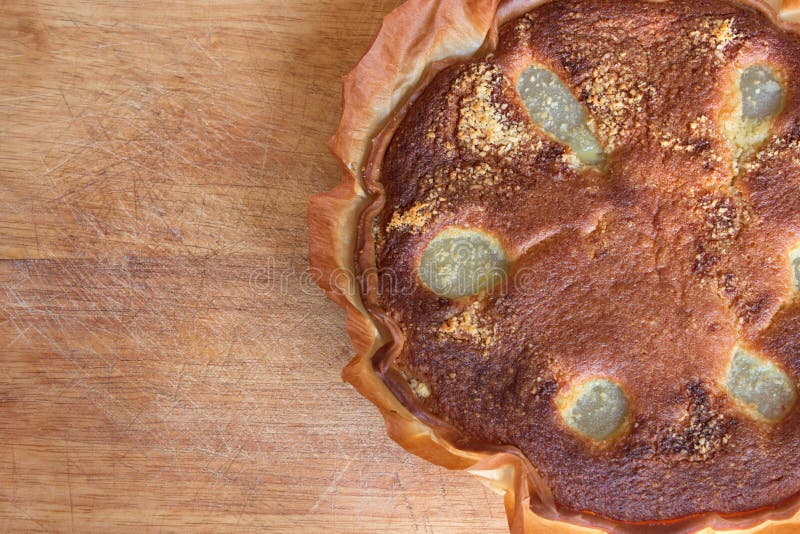 Traditional french Bourdaloue pie: a pie with almond marzipan cream and pears. Traditional french Bourdaloue pie: a pie with almond marzipan cream and pears.