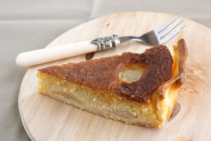 Traditional french Bourdaloue pie: a pie with almond marzipan cream and pears. Traditional french Bourdaloue pie: a pie with almond marzipan cream and pears.