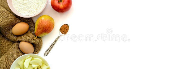 Banner with a set of ingredients for Apple pie on a white background. Copy space. Top view. Flat lay. Banner with a set of ingredients for Apple pie on a white background. Copy space. Top view. Flat lay