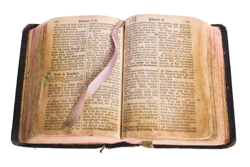 Old gothic antique vintage open bible with bookmark isolated on white background with cliping path. Old gothic antique vintage open bible with bookmark isolated on white background with cliping path.
