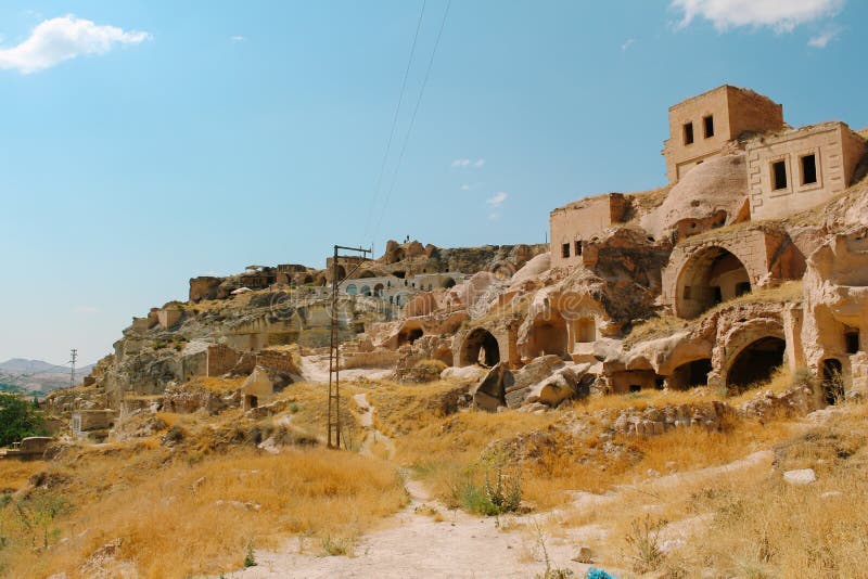 Παλαιό χωριό Cavusin, πόλη σπηλιών σε Cappadocia, Τουρκία στοκ εικόνες Παλαιό χωριό Cavusin, πόλη σπηλιών σε Cappadocia, Τουρκία στοκ εικόνες